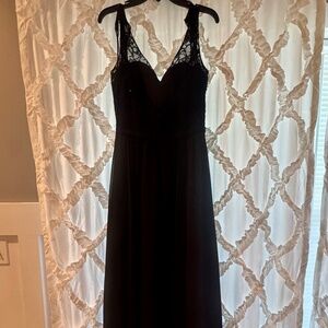 Black A-Line chiffon evening gown with beaded embroidery top.